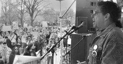 Moonanum James, co-leader of the United American Indians of New England and leader of the Troops Out Now coalition addressing 25,000 antiwar protesters on Boston Common, March 29, 2004  photo: Liza Green