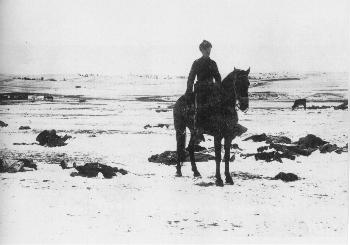 A Seventh Cavalry officer surveys the massacre scene three days following the Dec. 29, 1890, U.S. genocidal attack on the Lakota nation, led by Big Foot of the Hunkpapa Lakota, at Wounded Knee, Pine Ridge.